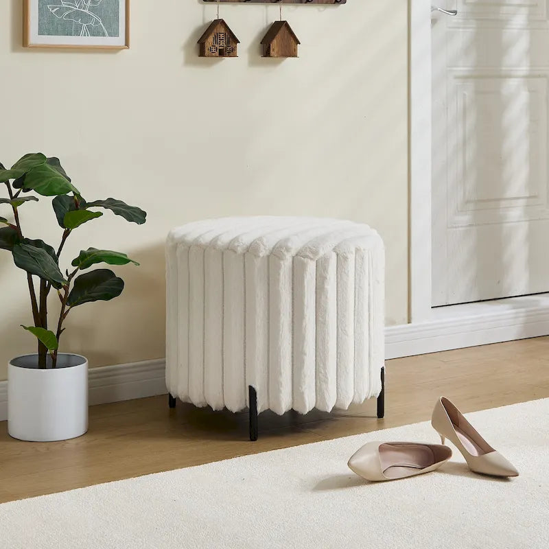 Pouf rond tapissé