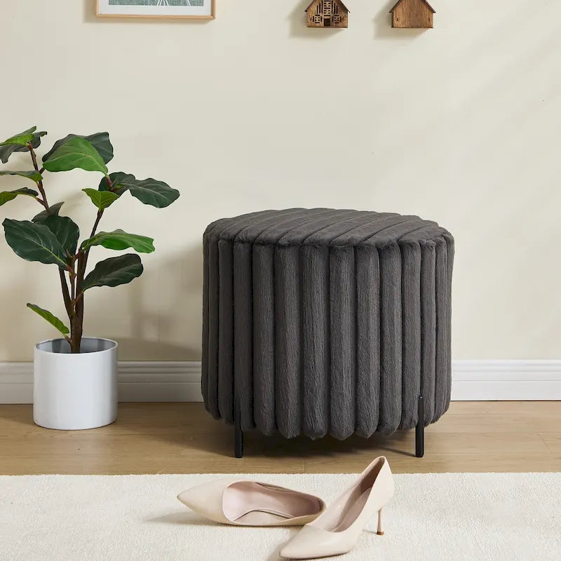 Pouf rond tapissé