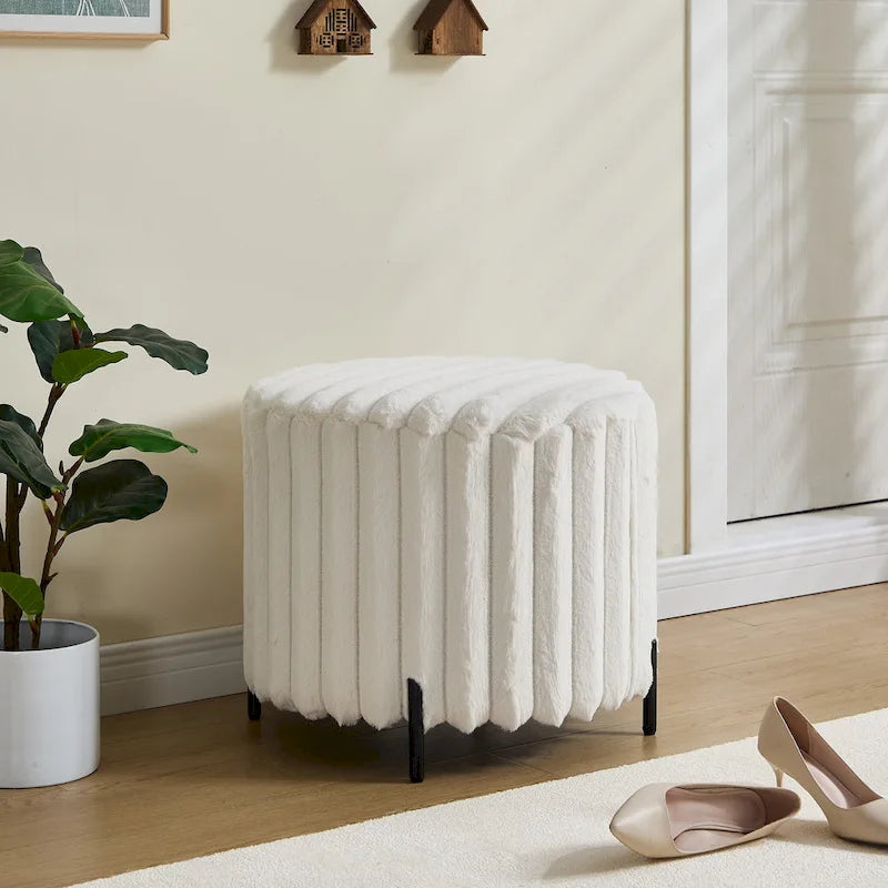 Pouf rond tapissé