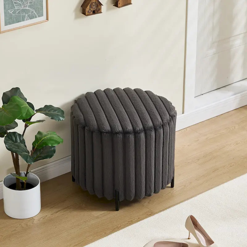 Pouf rond tapissé
