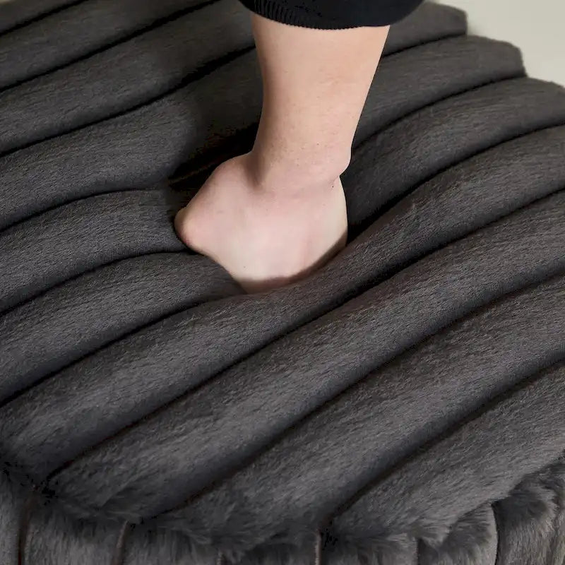 Pouf rond tapissé