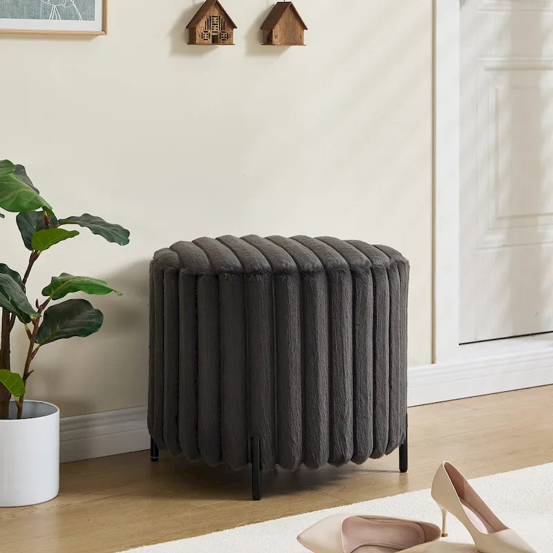 Pouf rond tapissé