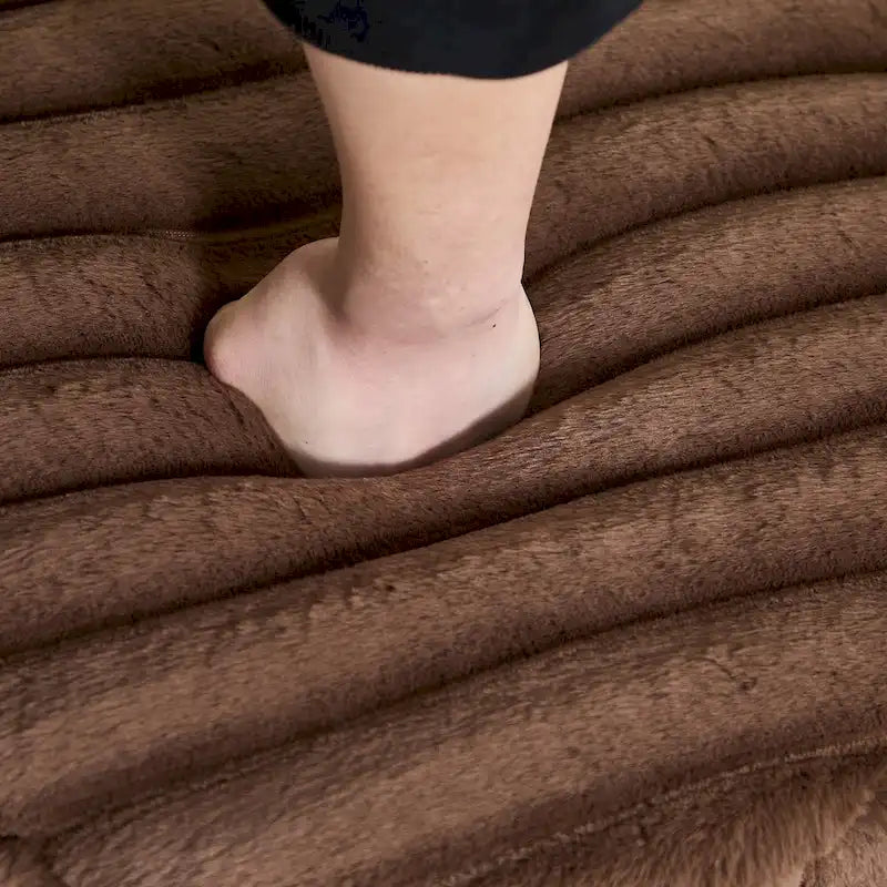Pouf rond tapissé