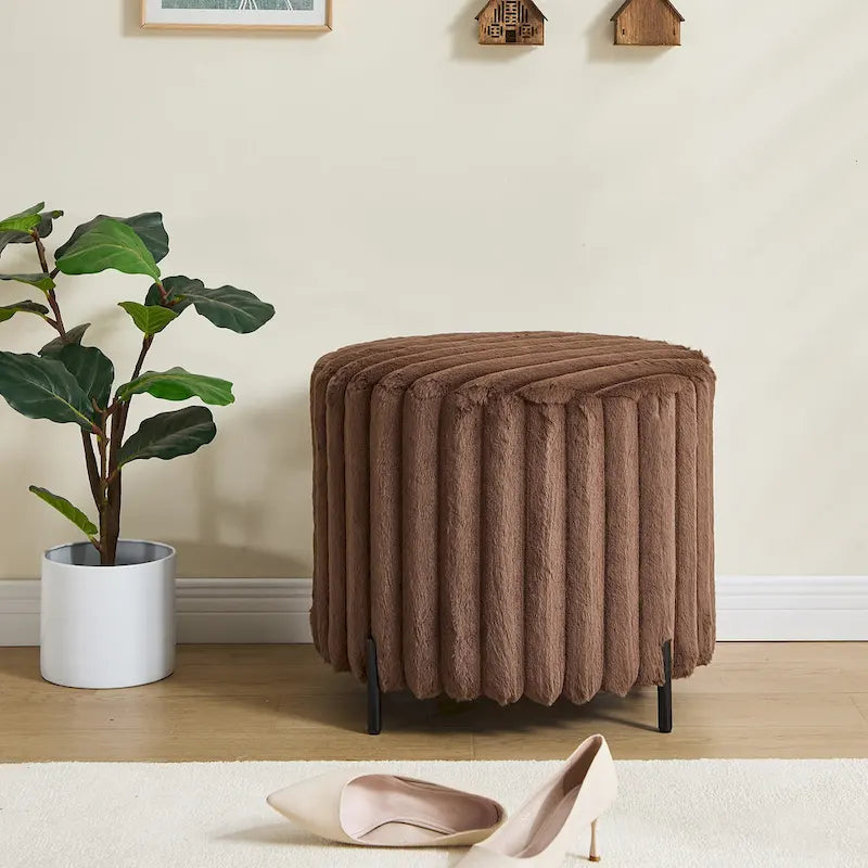 Pouf rond tapissé